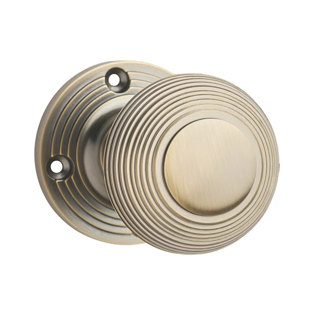 DESIGNER LEVERS BEEHIVE DOOR KNOB PAIR ANTIQUE BRASS 60MM - MonkeyTools